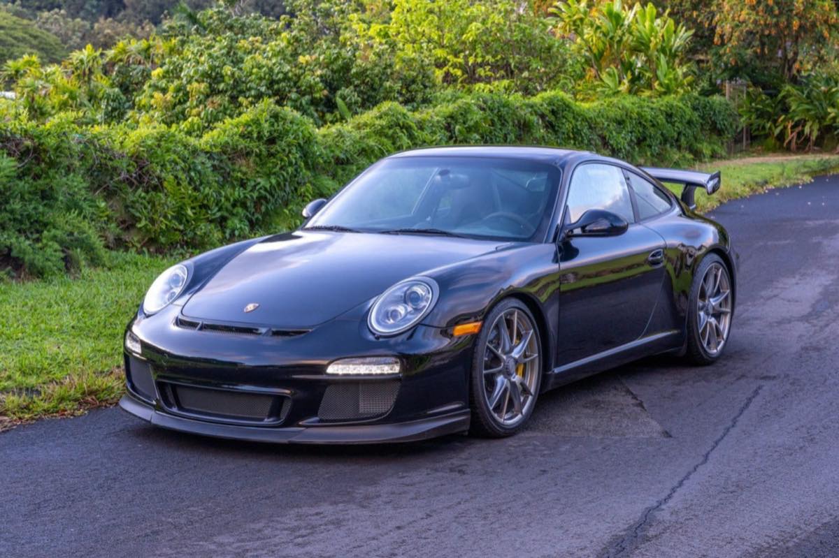 The anchor comparable: a black 2010 Porsche 911 GT3 with carbon-ceramic brakes, sold at auction in November 2024 for $180,000